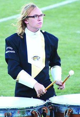 Timpani player Gage Deslaurier and the rest of the Pride of the West marching band will compete at Monday’s University Interscholastic League regional contest at Bulldog Stadium in Abilene.