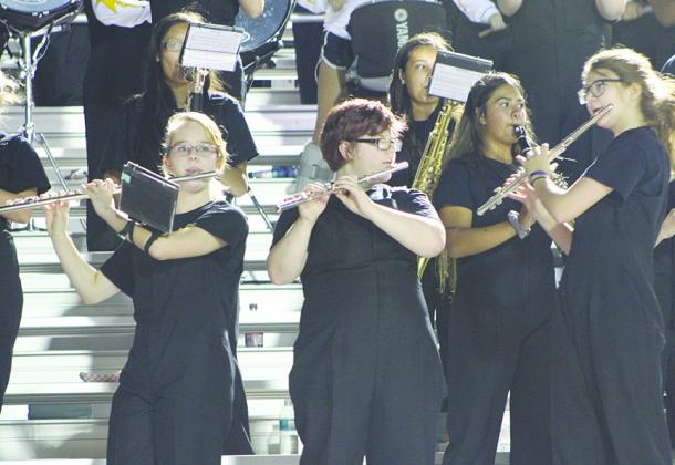 Snyder High School Pride of the West Marching Band members (l-r) Lisa Fisk, Alondra Tovar, Peyton Walker, Kynzie Avalos and Brailynn Garcia perform in stands during a recent home game. The band will compete at Saturday’s area contest in Lubbock.