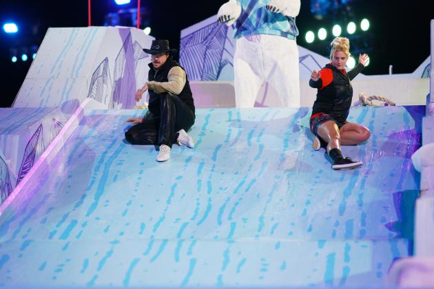 Tanner “White Buffalo” Beard (left) slid with fellow contestant “Scary” Mary Driscol down a slippery slope. Beard said the Slip and Putt obstacle was one of the show’s toughest.