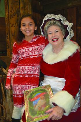 Brily Winkler, 9, was among the children who visited with Mrs. Claus during today’s Magic of Christmas at the Scurry County Museum. The annual event is one of two fundraisers for the museum.