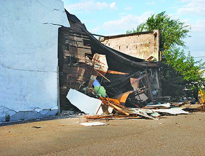 Part of the north wall of the Snyder Appliances building in the 2400 block of College Ave. collapsed today. The cause of the collapse is under investigation.