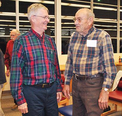 Historian Drew Bullard (left) visits with Bernhard Bartels following Thursday’s Historic Scurry County, Inc., meeting. Bullard updated the group on his research of J. Wright Mooar and the white buffalo he killed in Scurry County.