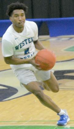 Western Texas College freshman CJ Smith drove to the basket during a 93-38 win over Loyalty Prep on Nov. 20. The Westerners will host Oklahoma City Storm at 2 p.m. today at The Coliseum.