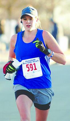 Candace Matthies is shown competing in a marathon earlier this year.