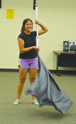 Vanessa Rascon practiced choreography to the Snyder High School fight song at the Best of the West color guard camp Wednesday.