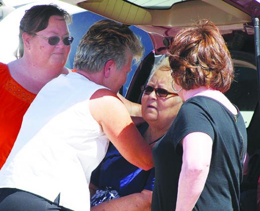 Connie Jones, Hailey’s grandmother, was consoled by friends after Scurry County Sheriff Trey Wilson announced the remains found at Lake J.B. Thomas were her those of her granddaughter.
