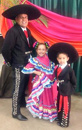 Luis Alaniz is pictured with his daughter Alexxus and son Xavier at the Cogdell Memorial Hospital Foundation gala in 2014.