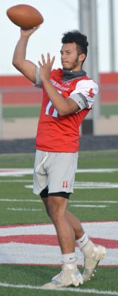 Hermleigh senior Devin Hildebrand made a throw during practice at Clarence Spieker Stadium last week. Hildebrand and junior Stetson Digby will be the main signal-callers for the Cardinals in 2020.