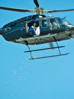 First Baptist Church Worship Leader Bill Hodges dropped Easter eggs from a helicopter during First Baptist Church’s Super Easter Egg Drop Sunday at Tiger Stadium.