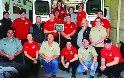 Scurry County EMS received the South Plains EMS Public/Private Provider of the Year award earlier this month. Pictured on the front row are (l-r) Jimmy Futrelle, Shane Terry, Sterling Williams, Drew Wilson, Jeremy Beal and Adam Wester. On the back row are Ty Lorenz, Jeremy Moody, Jason Gruben, Jason Tyler, Elaine Gutierrez, Rebecca Durham, Russel Thomas, Katrina Reynolds, Brenda Alvarado, January Blackwell, Cindy Josey and Jaffin Durham. 