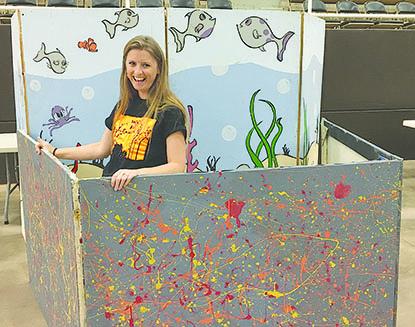 Kat Nielson, Western Texas College’s director of college advancement, set up the fishing booth for today’s fall festival at The Coliseum. All proceeds from the benefit will benefit the Scurry County United Way campaign. The festival will begin at 6 p.m. and a costume parade is scheduled for 6:15 p.m.
