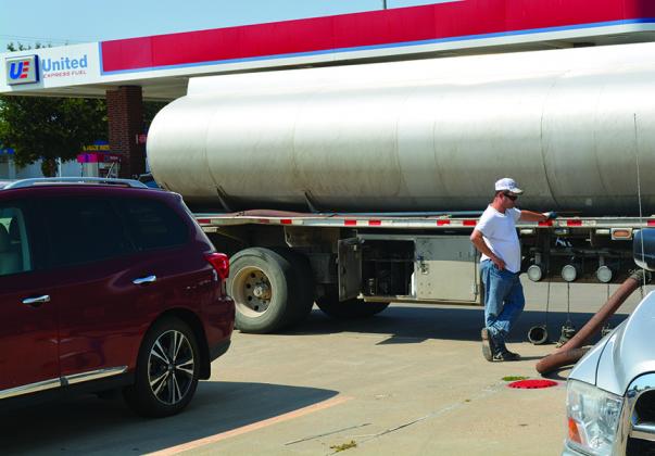Tim Hoppe of Griffin Fuel Transportation delivered gasoline to United Express Thursday afternoon. A second truck refilled the tanks today after unfounded rumors about gas shortages led to runs on gas stations around the state.