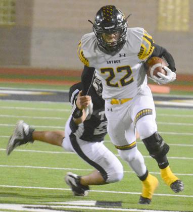 Snyder senior running back Greg Williams broke a tackle from a Lamesa defender during Snyders’ 21-8 win over the Golden Tornadeos on Nov. 1. The Tigers will take on the Dalhart Wolves in the bi-district playoffs at 7 p.m. today at Greg Sherwood Memorial Stadium in Plainview. 