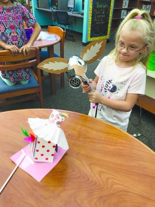 Second grader Abigail Israel worked on a STEM project at Snyder Primary School’s Habit Hero Camp. Students were asked to build a house that the Big Bad Wolf could not blow down.
