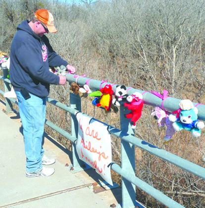 Joey Roland tied a stuffed animal on the Hwy. 208 bridge in Dunn days after the teen’s disappearance.
