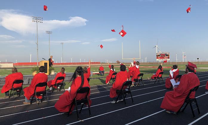 Hermleigh ISD graduates tossed their caps into the air following the ceremony.