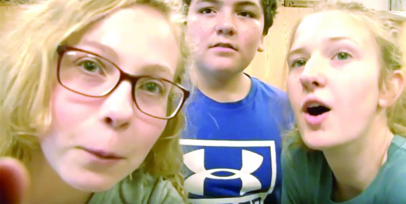 Pictured (l-r), Ira High School students Kaylin Burt, Rykin McCown and Anzlee Hale perform in a student-produced STAAR parody video for UIL competition.