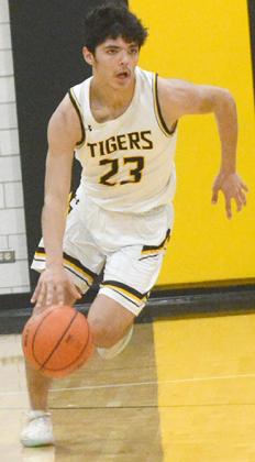 Snyder senior Jayden Samaniego drove the ball down the court during a win over Brownfield last week. The Snyder Tigers blasted San Angelo Central, 66-30, Saturday and have now won three straight to improve to 3-1. The Tigers will take on Hereford at 5 p.m. Thursday to kick-off the Hereford Tournament.