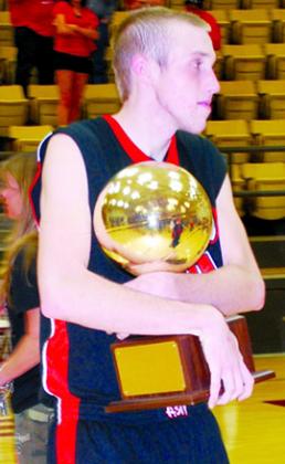 Ira 2012 graduate Kylor Fine embraced the area championship trophy in 2011. Fine won back-to-back district MVPs in 2010 and 2011, earning him a spot on The Snyder News All-Decade series.