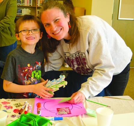 Kayla Hess and her son, Colby, did Mother’s Day-related arts and crafts at the Scurry County Library Friday morning.