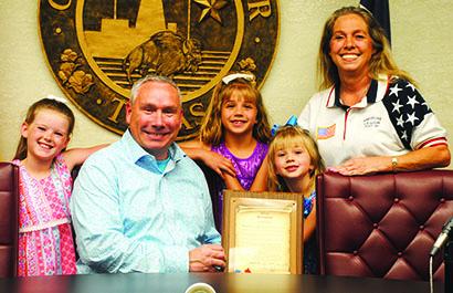 Snyder City Council Mayor Pro Tem Steve Highfield presented a Memorial Day proclamation signed by Mayor Tony Wofford to the American Legion Post No. 181 and Auxiliary. Pictured are (l-r) Elizabeth Fisk, 10, Highfield, Paisley Perez, 7, Jacey Gentry, 5, and American Legion Auxiliary Chaplain Judy Ragland. 