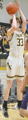 Snyder junior Zach Miller shot a 3-pointer during the Tigers’ 56-52 loss to Abilene Wylie Friday