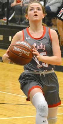 Hermleigh freshman Aubree Myers went for a layup during the Lady Cardinals’ 83-7 win over Loraine Friday. Myers scored 10 points and recorded seven steals.