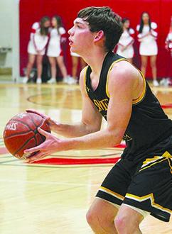 2019 graduate Nathan Kendrick prepared to shoot a 3-pointer. Kendrick averaged 6.7 points per game in the Tigers’ 2019 district championship season.