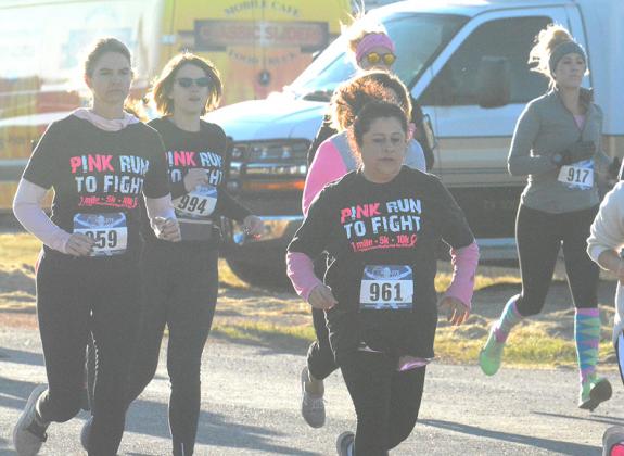 From left, Melissa Lee, Shae Rinehart and Michelle Read competed in this morning’s 5K Pink Run sponsored by Cogdell Memorial Hospital. More than 150 runners competed in the 10K, 5K and one-mile walk in Towle Park to raise money for the hospital’s October mammogram specials.