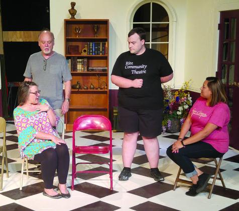 Ritz Community Theatre actors (l-r) Dava Robbins, Bill Martin, Glenn Burns and Rachel Lentz rehearse a scene from Play On!, which opens at 7 p.m. Tuesday.