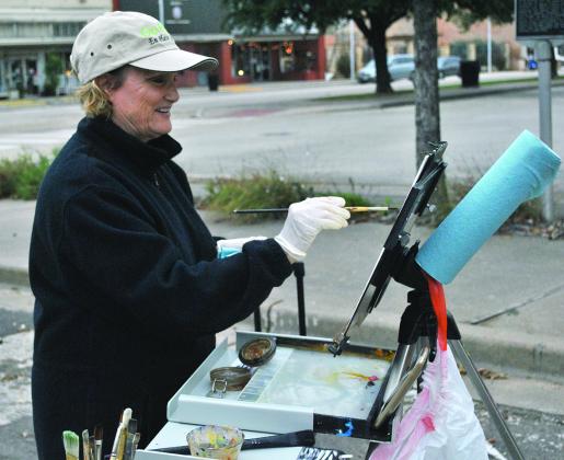 Janet Lay, an artist from San Angelo, painted a landscape based on the downtown square during Saturday’s Plein Air on the Square art competition hosted by the Scurry County Arts Collective.