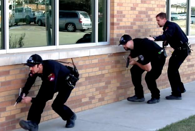 Pictured (from left), Snyder Police Officers Maeson Rojas,  Tanner Kelley and Rustin Webb take part in an active shooter exercise at Cogdell Memorial Hospital. All photos accompanying this story are taken from the Snyder Police recruitment video produced by the Hermleigh High School Audio/Video Production class.
