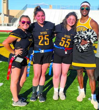 Snyder High School seniors (l-r) Zowie Rodriguez, Alexius Luera, Hanna Alcaraz and J.J. Burns after Tuesday’s powderpuff football game at Tiger Stadium.