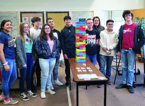 Students in Snyder High School’s Pathways in Technology Early College High School (PTECH) program played an oversized game of Jenga Friday as a focus for a discussion on careers. Pictured (l-r)  are ninth graders Illeana Madrid, Emily Davis, Brycen English, Larrisa Wilkinson, Ryder Garcia, Damien Jimenez, Shad Hodge, Jennifer Ramirez, David Santos and Corey Thomas.  