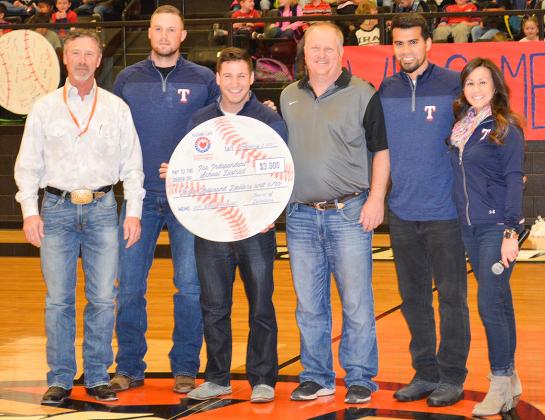 The Texas Rangers Foundation presented a $3,000 grant to Ira ISD’s baseball program Friday afternoon. Pictured are (l-r) Ira Superintendent Jay Waller, Andrew Faulkner, Jared Sandler, Ira baseball coach Toby Goodwin, Robinson Chirinos and Texas Rangers Foundation Executive Director Karin Morris.