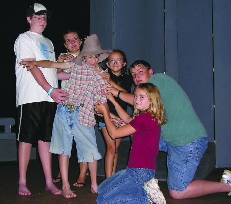 Pictured are cast members (l-r) Jonathan Speegle, Kristin Miller, Logan Tabor, Hillorie Earnest, Casey Arnold and Ashley Kincheloe from the 2005 production of Wiley And The Hairy Man at the Ritz Community Theatre.