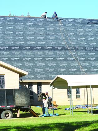 Roofers from Andrus Brothers Roofing of Lubbock replaced the roof at First United Methodist Church on Wednesday.