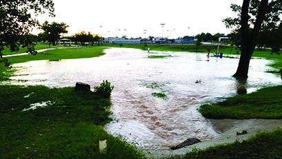 Rainwater flooded Towle Park Monday night after a thunderstorm dropped hail and rain in Snyder. Scurry County was under a thunderstorm watch during the evening hours as the system moved through the region. Rain will remain the forecast this week.