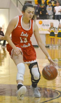 Hermleigh senior Ryleigh Benitez dribbled into the paint. Benitez made four 3-pointers in the win.