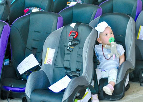 Scarlett Camp seemed to choose the safety seat best suited for her during a child safety seat check-up hosted by the Texas Department of Public Safety and Scurry County first responder agencies at the law enforcement center Wednesday afternoon.