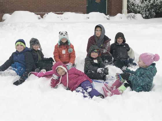 Many children took advantage of the Wednesday snow day by playing outdoors. These children were outside Colnial Hill Baptist Church. Pictured on the front row are (l-r) Olivia Taylor, Henry Taylor and Scout Spence. On the back row are Xach Johnson, Jack Johnson, Emily Taylor, Troy Santos and Ethan Santos.  If you’d like to have your snow photos run in the Snyder Daily News, submit them to lifestyles@snyderdailynews.com with names and location.