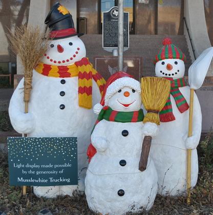 Three snowmen usher in the winter season in front of the Scurry County Courthouse Friday. Snyder will see lows in the 30s and 40s for most of next week as the winter season continues to roll in.