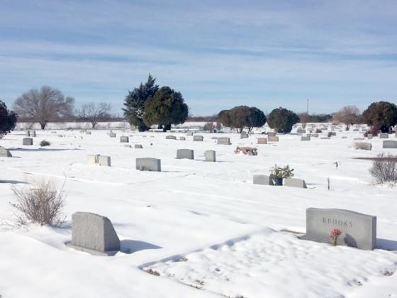Snow covers the ground in Snyder Cemetery.