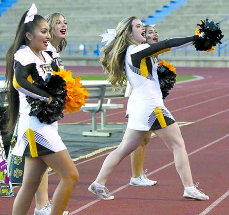 Snyder cheerleaders (l-r) Kimberly Cortez, Macie Palacios, Tegan Dickson and Chloe Rodriguez lead the fans in a cheer during Snyder’s 32-19 loss to San Angelo Lake View at San Angelo Stadium Thursday. For more on the game, see page 8.