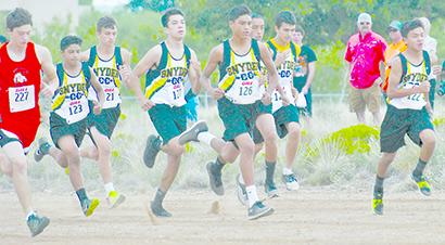 SDN Photo/Steve Reagan Snyder’s Christian Escobedo (right) and Corey Landin set the pace at the start of the boys’ high school race at the Western Texas College Cross County Open Saturday. Escobedo won the race and Landin finished fifth. 