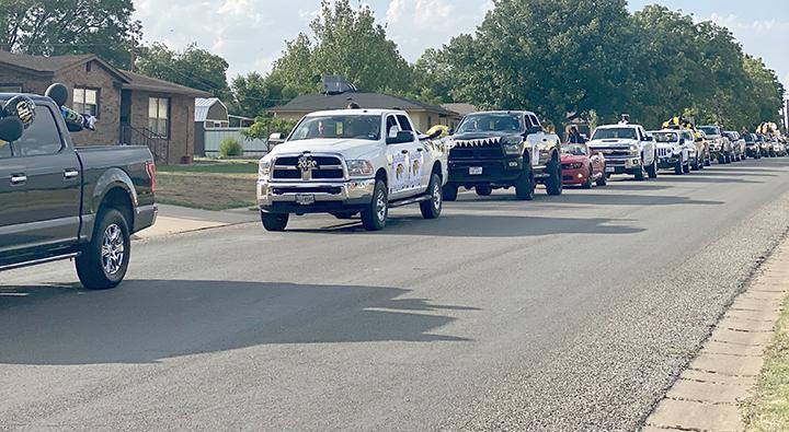 Snyder High School 2020 graduates decorated their vehicles and rode with family members through Towle Park and the surrounding neighborhoods in the schools’ adjusted graduation ceremony.