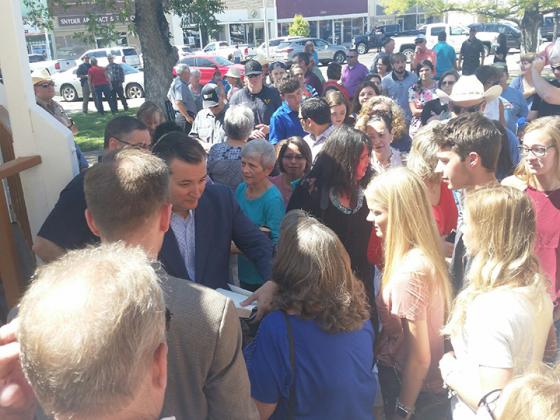 Sen. Ted Cruz (holding book) signed autographs for Scurry County residents following his town hall meeting on the Scurry County Courthouse lawn. Cruz encouraged residents to vote on Nov. 6 while also discussing issues facing the United States.