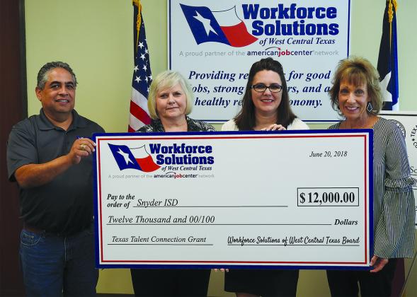 Snyder Independent School District was awarded $12,000 by the Workforce Solutions of West Central Texas Board Wednesday afternoon as part of the Texas Talent Connections program. Pictured are (l-r) Workforce Board President Samuel Garcia, Donna Cutler, Snyder ISD Assistant Superintendent of Curriculum and Instruction Dr. Rachael McClain and Rene Ralston.