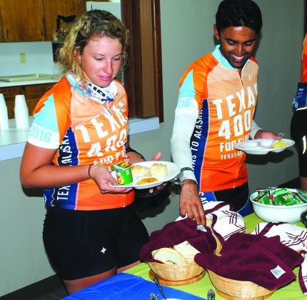 Elizabeth Knoble (left) and Shantanu Banerjee ate breakfast at East Side Church of Christ today. 