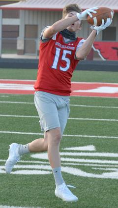  Hermleigh senior Tyler Thompson made a catch during practice at Clarence Spieker Stadium Thursday. Thompson is one of two seniors on the Cardinal roster.
